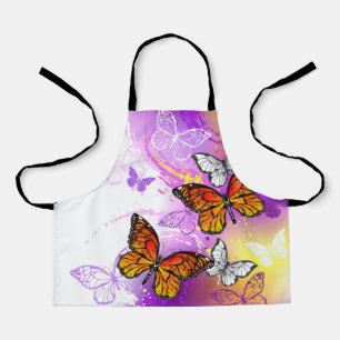 Monarch Butterflies on Purple Background Apron