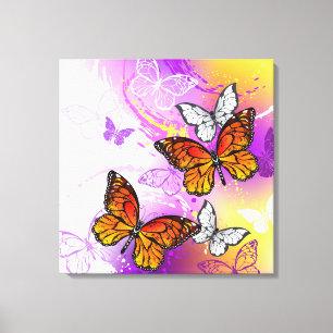 Monarch Butterflies on Purple Background Canvas Print