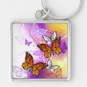 Monarch Butterflies on Purple Background Keychain