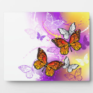 Monarch Butterflies on Purple Background Plaque