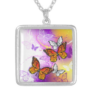 Monarch Butterflies on Purple Background Silver Plated Necklace