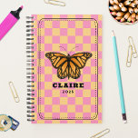 Monarch Butterfly Checkerboard Planner<br><div class="desc">Monarch butterfly illustration over a pink and golden yellow checkerboard background with black frame and text templates for name and year.</div>