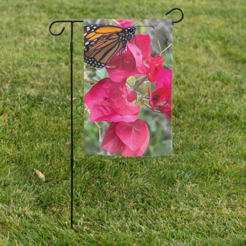 Monarch butterfly on bougainvillea flowers garden flag