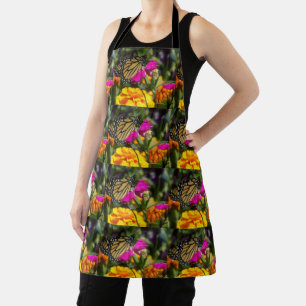 Monarch butterfly on pink marigold apron