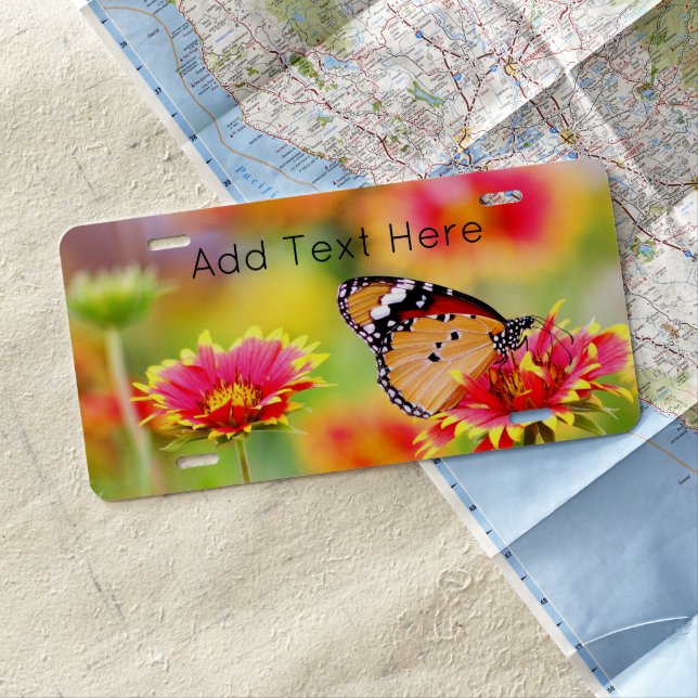 Monarch Butterfly on Red and Yellow Flower License Plate (In Situ)