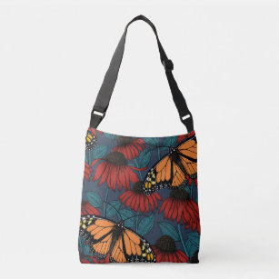 Monarch butterfly on red coneflowers crossbody bag