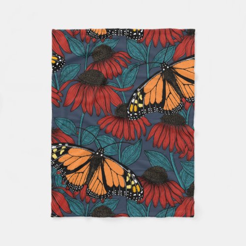 Monarch butterfly on red coneflowers fleece blanket