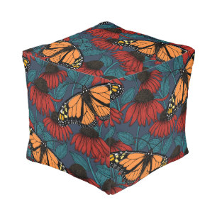 Monarch butterfly on red coneflowers pouf