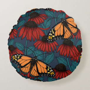 Monarch butterfly on red coneflowers round pillow