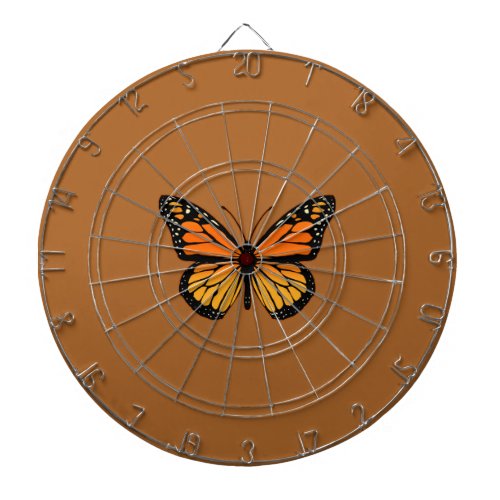 Monarch Butterfly on Sienna Dartboard With Darts