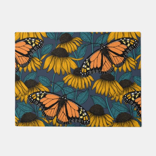 Monarch butterfly on yellow coneflowers doormat