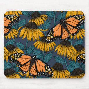 Monarch butterfly on yellow coneflowers mouse pad