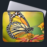 Monarch Butterfly Sip Design Laptop Sleeve<br><div class="desc">Witness a beautiful monarch butterfly gracefully sipping nectar from a vibrant orange flower. Explore the delicate interaction of nature and pollinators (This Design Made With AI). Place Order Today and Embrace the Joy of Shopping!</div>