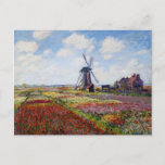 Monet Field of Tulips With Windmill Postcard<br><div class="desc">Monet Field of Tulips with Windmill postcard. Oil painting on canvas from 1886. One of Monet’s most colorful works painted around the Rijnsburg Windmill. The tulip fields are bursting with reds, whites, yellows and greens. A beautiful landscape painting that makes a great gift for fans of Claude Monet, tulips, impressionism,...</div>