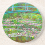 Monet Japanese Bridge and Water Lilies Coaster<br><div class="desc">Sandstone Coaster featuring Claude Monet’s oil painting of a Japanese bridge and flowers. Beautiful water lilies and bridge inspired by the artist’s garden and pond in Giverny. A great Monet gift for fans of impressionism and French art.</div>