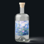 Monet Pink Water Lilies  Liquor Bottle Label<br><div class="desc">A Monet pink water lilies liquor label featuring beautiful pink water lilies floating in a calm blue pond with lily pads. A great Monet gift for fans of impressionism and French art. Serene nature impressionism with lovely flowers and scenic pond landscape.</div>