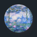 Monet Pink Water Lilies  Paper Plates<br><div class="desc">Monet pink water lilies 7 inch paper plates featuring beautiful pink water lilies floating in a calm blue pond with lily pads. A great Monet gift for fans of impressionism and French art. Serene nature impressionism with lovely flowers and scenic pond landscape.</div>