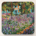 Monet The Artist’s Garden at Giverny Beverage Coaster<br><div class="desc">A Monet flower coaster set featuring beautiful pink and purple irises in a garden shimmering underneath tall trees. A great Monet gift for fans of impressionism and French art. Peaceful nature impressionism with lovely flowers and scenic landscape.</div>