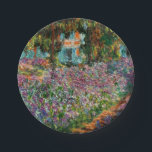 Monet The Artist’s Garden at Giverny  Paper Plates<br><div class="desc">A Monet flower paper plate featuring beautiful pink and purple irises in a garden shimmering underneath tall trees. A great Monet gift for fans of impressionism and French art. Peaceful nature impressionism with lovely flowers and scenic landscape.</div>