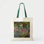 Monet The Artist’s Garden at Giverny Tote Bag<br><div class="desc">A Monet flower tote bag featuring beautiful pink and purple irises in a garden shimmering underneath tall trees. A great Monet gift for fans of impressionism and French art. Peaceful nature impressionism with lovely flowers and scenic landscape.</div>