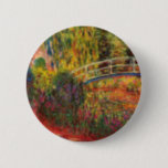 Monet Water Lily Pond and Water Irises Button<br><div class="desc">Button featuring Claude Monet’s oil painting of a Japanese bridge and beautiful flowers. Water lily pond and water irises bathed in pink light. Serene nature impressionism with lovely flowers and scenic pond landscape. A great Monet gift for fans of impressionism and French art.</div>