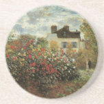Monet's Garden at Argenteuil by Claude Monet Drink Coaster<br><div class="desc">The Artist's Garden in Argenteuil (A Corner of the Garden with Dahlias) (1873) by Claude Monet is a vintage impressionism fine art floral nature painting. A country farm house is in the background. A couple in love is walking past a romantic spring season garden with blooming roses and other flowers....</div>