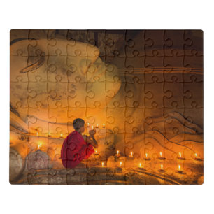 Monk Praying By A Buddha Jigsaw Puzzle