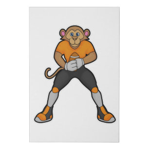 Monkey as Football player with Football Faux Canvas Print
