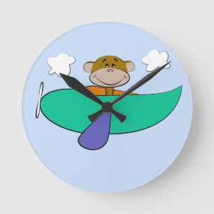 Monkey in Colorful Airplane Round Clock