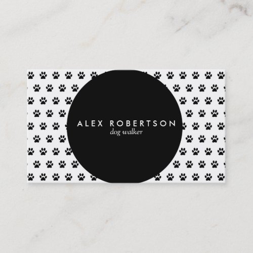 Monochrome black circle and white paw print business card