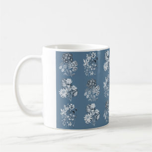 Monochrome flowers in blue coffee mug
