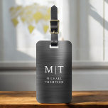 Monogram Black Brushed Metallic Elegant Luggage Tag<br><div class="desc">Elevate your travel experience with our Classic Elegant Modern Minimalist Monogram Luggage Tag. This meticulously designed accessory seamlessly combines timeless elegance with contemporary minimalism, ensuring your luggage stands out with sophistication. Crafted with precision and attention to detail, this luggage tag is more than just a practical item; it's a personalized...</div>