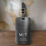 Monogram Black Brushed Metallic Elegant Luggage Tag<br><div class="desc">Elevate your travel experience with our Classic Elegant Modern Minimalist Monogram Luggage Tag. This meticulously designed accessory seamlessly combines timeless elegance with contemporary minimalism, ensuring your luggage stands out with sophistication. Crafted with precision and attention to detail, this luggage tag is more than just a practical item; it's a personalized...</div>