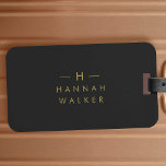 Monogram Black Gold | Modern Minimalist Elegant Luggage Tag<br><div class="desc">A simple stylish custom monogram design in a gold modern minimalist typography on an off black background. The monogram initials and name can easily be personalized along with the feature line to make a design as unique as you are! The perfect bespoke gift or accessory for any occasion.</div>