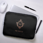 Monogram Black Pink Elegant Rose Gold Crest Name Laptop Sleeve<br><div class="desc">An elegant black and rose gold design with the monogram initial in a vintage crest, recommended for a woman. The crest is (faux) rose gold, the background is blush pink. Under the crest, there is the name in caps. The text is a darker pink, similar to the crest. The vintage...</div>