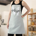 Monogram Brush Calligraphy Sage Green Apron<br><div class="desc">In the realm of culinary arts, individuality and style are as significant as the flavors you create. Our personalized apron, adorned with a tastefully designed monogram and your name, serves as an emblem of your unique culinary identity. The font duo—comprising an elegant serif font for the monogram and a modern...</div>