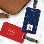 Monogram Chic Red Ribbon Polka Dot Blue Luggage Tag<br><div class="desc">Travel in style with this chic monogram luggage tag featuring a blue bordered square with a red ribbon against a blue and white polka dot pattern. Personalize it by replacing the placeholder text. For more options such as to change the font and it's size/color or the spacing between letters click...</div>