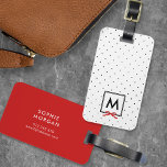 Monogram Chic Red Ribbon Polka Dot Luggage Tag<br><div class="desc">Travel in style with this chic monogram luggage tag featuring a black bordered square with a red ribbon against a black and white polka dot pattern. Personalize it by replacing the placeholder text. For more options such as to change the font and it's size/color or the spacing between letters click...</div>