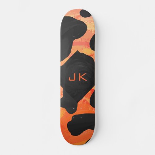 Monogram Cow Black and Orange Print Skateboard