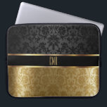 Monogram Damask Black with Gold Floral Laptop Sleeve<br><div class="desc">Electronic Laptop Sleeve. Damask Black with Gold Accents pattern design with monogram letters ready for you to personalize. ⭐This Product is 100% Customizable. Graphics and/or text can be added, deleted, moved, resized, changed around, rotated, etc... ✔(just by clicking on the "EDIT DESIGN" area) ⭐99% of my designs in my store...</div>