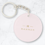 Monogram Elegant Minimal Blush Pink and Gold Keychain<br><div class="desc">A simple stylish custom monogram design in a gold modern minimalist typography on an elegant pastel blush pink background. The monogram initials and name can easily be personalized along with the feature line to make a design as unique as you are! The perfect bespoke gift or accessory for any occasion....</div>