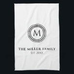 Monogram | Family Name | Black & White Medallion Kitchen Towel<br><div class="desc">Stylish monogrammed kitchen towel features custom family name, monogram initial and year established date. Minimalist white kitchen towel with modern decorative stylized medallion in black and white. Monogram initial and family name presented in modern typography with coordinating decorative accents. A perfect addition to your kitchen decor or a thoughtful modern...</div>