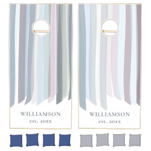 Monogram family name pastel stripes watercolor cornhole set