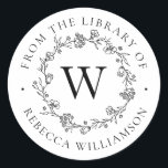 Monogram Floral Wreath From the Library Bookplate<br><div class="desc">Add an elegant touch to all your favorite books with our chic Floral Wreath Monogram From the Library of Bookplate, featuring your single initial monogram in classic serif lettering, framed by a hand-drawn wreath of flowers, buds and tiny botanical leaves. "From the library of" appears in a gorgeous circular arc...</div>