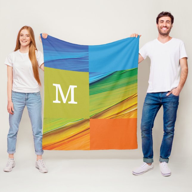 Monogram geometric colorful design fleece blanket (In Situ)