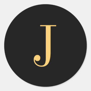 Monogram J gold-colored on black background Classic Round Sticker
