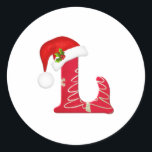 Monogram letter L, Santa hat Christmas  Sticker<br><div class="desc">Monogram letter L with Santa hat and holly Christmas  StickeW</div>