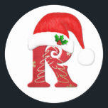 Monogram letter R, Santa hat Christmas Classic Round Sticker<br><div class="desc">Monogram letter R with Santa hat and holly Christmas  Sticker</div>