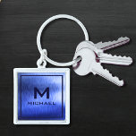 Monogram Metallic Blue Textured Personalized Name Keychain<br><div class="desc">Monogram Metallic Blue Textured Personalized Name keychain features a textured abstract metallic blue design with your monogram and personalized name. Personalize by editing the text in the text boxes provided. Designed by ©Evco Studio www.zazzle.com/store/evcostudio</div>