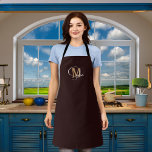 Monogram name black gold apron<br><div class="desc">A stylish black background. Personalize and add your first name and monogram initial.  . White and golden text.</div>